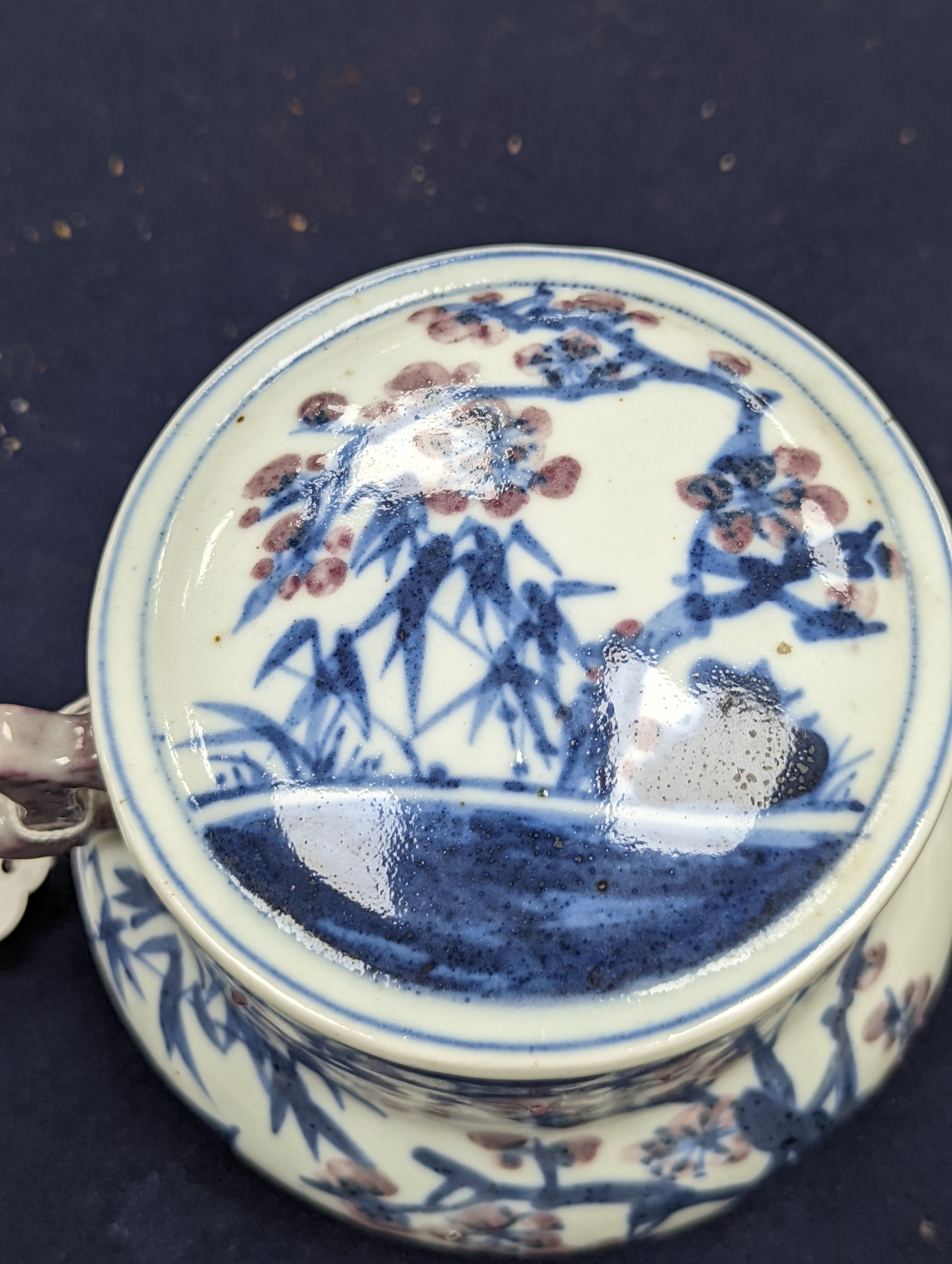A Chinese underglaze blue and copper red jar and cover, Xuande six character mark but later 12cm